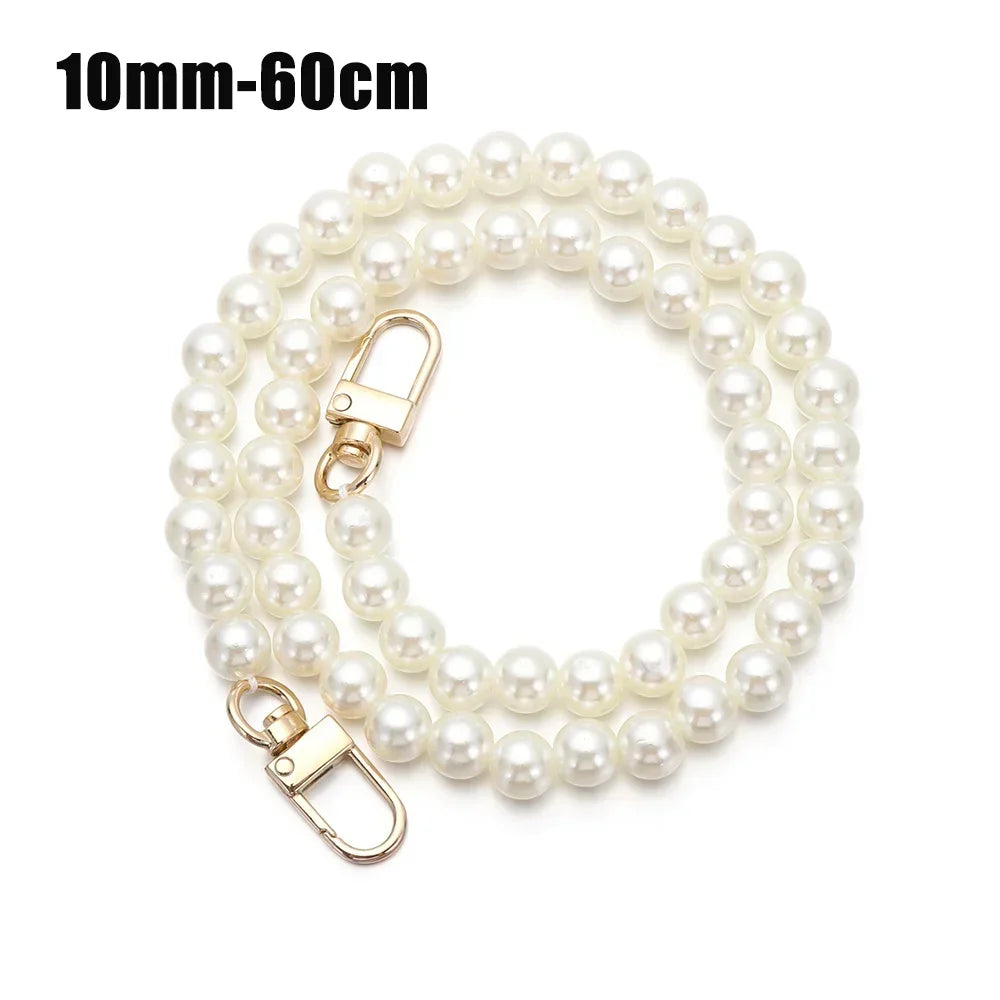 A strand of small, round white pearls used as an elegant chain strap for bags or purses.