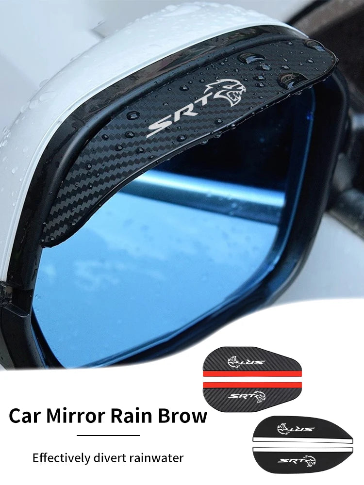 A close-up of an SRT carbon fiber rain brow installed on a car mirror, effectively diverting rainwater.