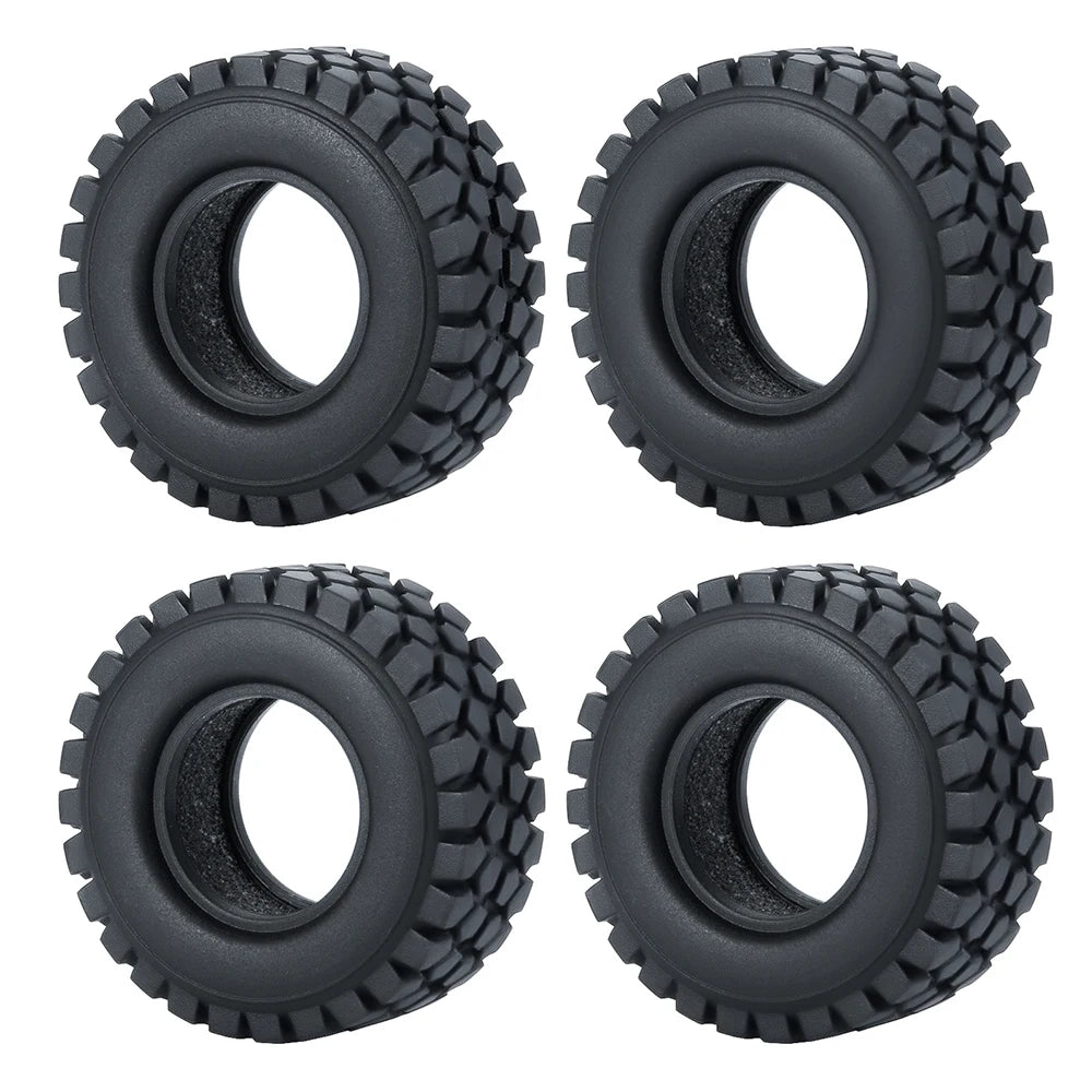 Four black soft rubber tires for 1/18 and 1/24 RC crawler cars shown from different angles