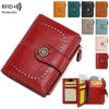A red leather wallet with multiple card slots and RFID protection features shown in various colors.
