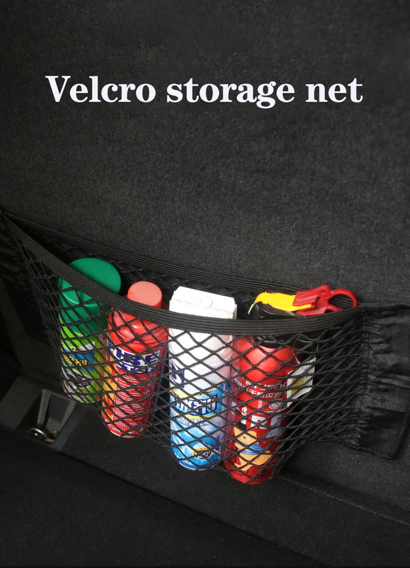Velcro storage net filled with various colorful bottles and containers inside a black organizer pocket