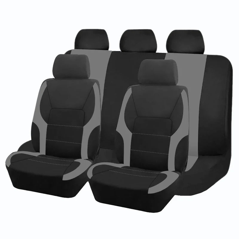 A set of black and gray two-tone car seat covers for a front seat.