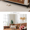 A brown Christmas tree chenille sofa cover with gold embroidery and red accents displayed on a white sofa.