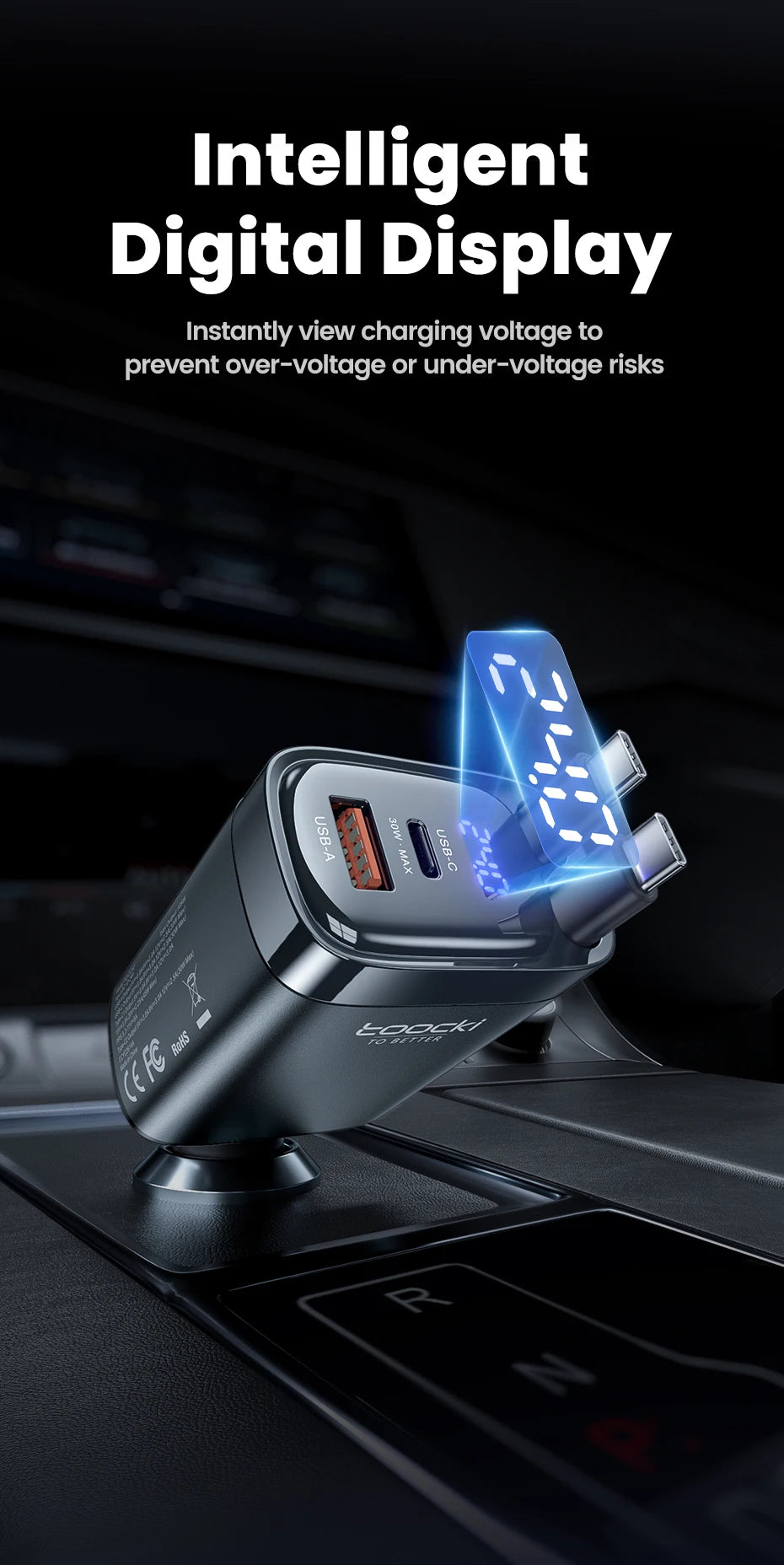 A close-up of a black car charger with a blue digital display showing voltage information.