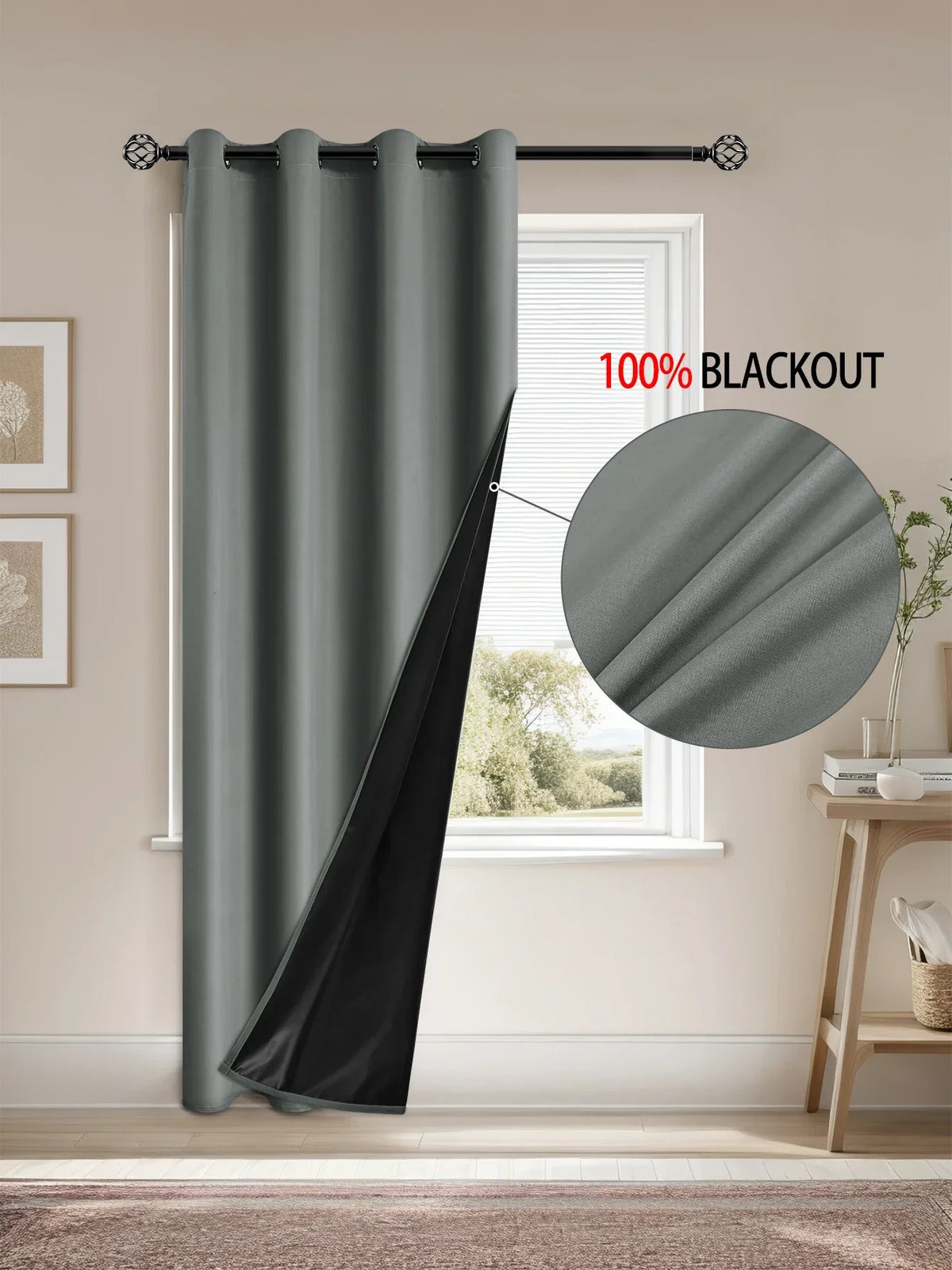 A dark gray blackout curtain is shown hanging in a window, demonstrating its full coverage and blackout capability.