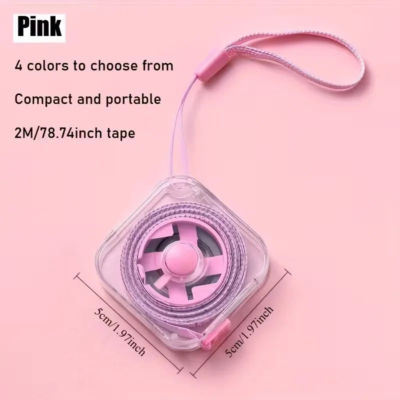 Cinta métrica retráctil suave rosa con carcasa de plástico transparente y cordón rosa