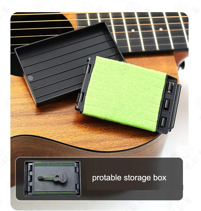 A portable storage box with a bright green microfiber cloth placed on a wooden guitar fretboard.