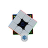 A white magnetic speed cube puzzle with a black center and green accents.