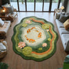 A round plush rug featuring an orange koi fish pattern surrounded by green and peach floral designs.