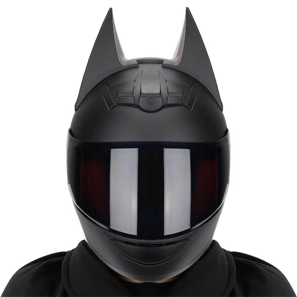 Black Bat Ear full face motorcycle helmet with detachable horns shown on a person's head.