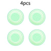 Set of four light green circular sound insulation pads for car trunk shock absorption