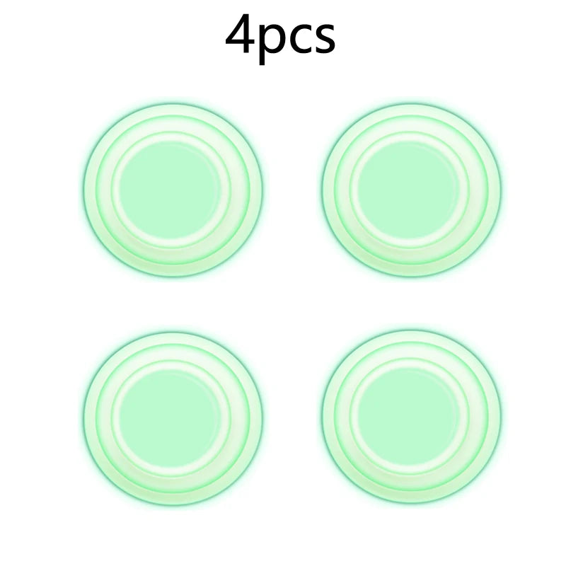 Set of four light green circular sound insulation pads for car trunk shock absorption