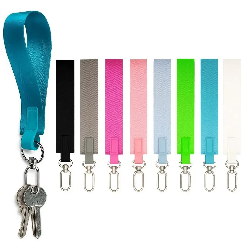 Multicolor nylon wristlet keychain strap with various colored fabric strips and metal key rings