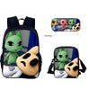 A black backpack featuring a green cat character and a beige animal character, with an inset showing other animal characters.