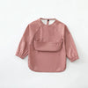 A soft dusty rose waterproof long-sleeve art smock for toddlers.