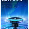 A black magnetic wireless car charger mount with a glowing blue RGB light resting on a reflective surface.