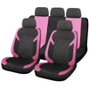 A set of black and pink honeycomb mesh car seat covers shown in a row.