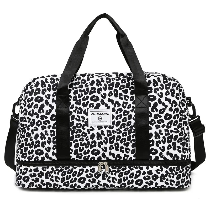 A black and white leopard print duffle bag with black straps and a Ziumanni logo.