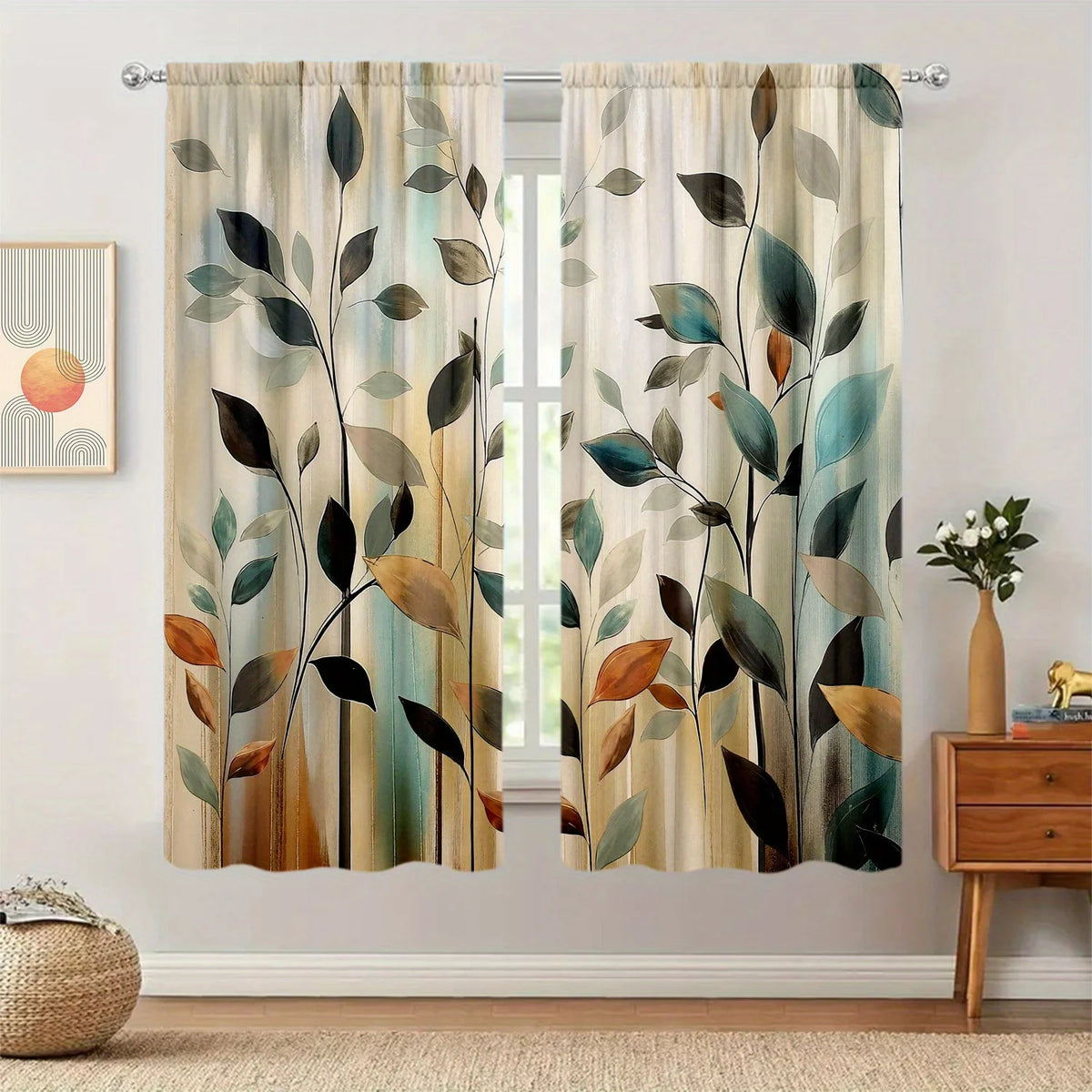 A set of two sheer curtains featuring an abstract leaf print in shades of green, brown, and gold.