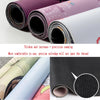 Rolls of purple and white mouse pads showing thick and precision sewing for a gaming mouse pad