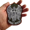 A stitched patch featuring an archangel design with wings and the name St. Michael Protectus on a dark green background.