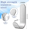 A silver stainless steel wall hook with smooth edges and a curved design shown in various views.