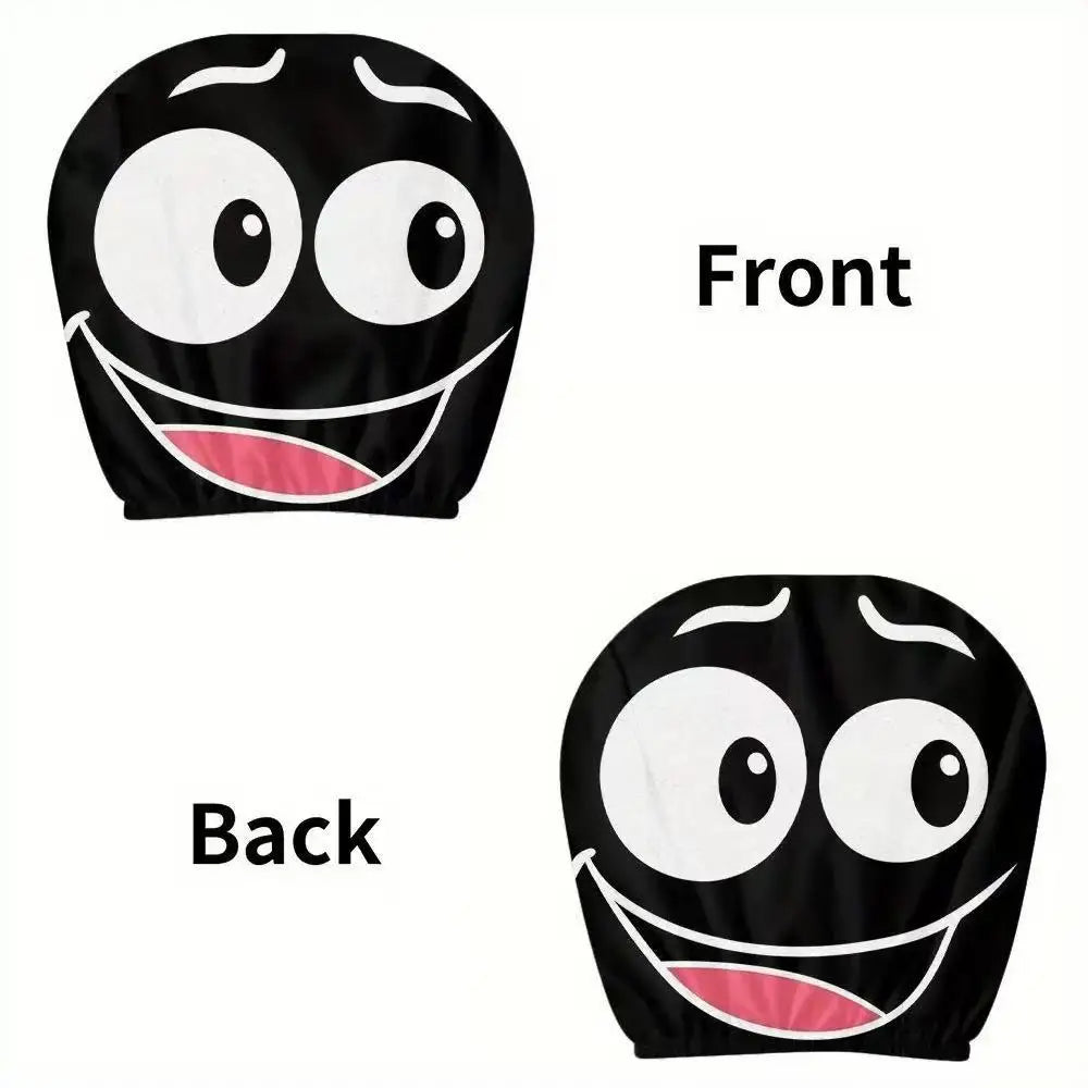 A pair of black and white horror-themed car headrest covers showing a creepy face design from the front and back.