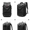 Black expandable travel laptop backpack shown in angle presentation with vacuum compression features.