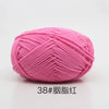A ball of pink 38-ply yarn used for knitting and crochet