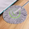 A gray, hand-free self-wringing spin mop with a rotating head is shown on a wooden floor.