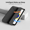 A black magnetic flip smart cover for an iPad is shown, demonstrating the open to wake and close to sleep functions.