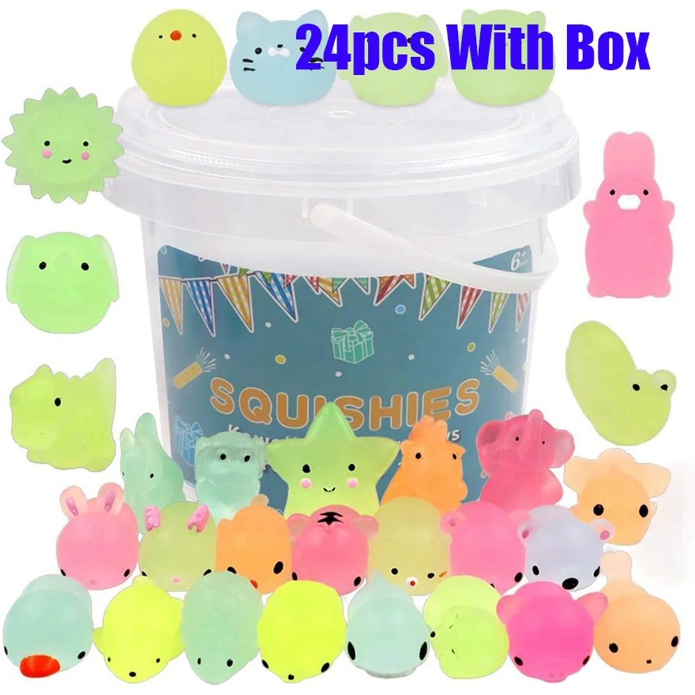 A collection of 24 glow-in-the-dark squishy toys in various animal shapes packaged with a box.