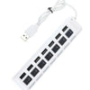 Weißer 7-Port-USB-Splitter-Hub mit individuellen Ein-/Ausschaltern und abnehmbarem Kabel.