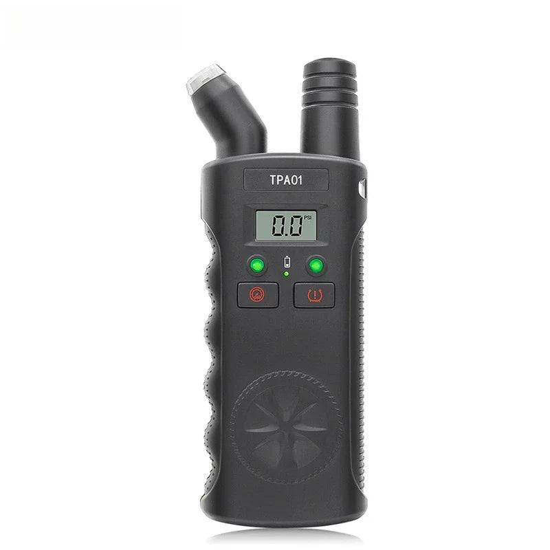 A black TPMS relearn tool with a digital tire pressure gauge displaying 0.0 PSI.