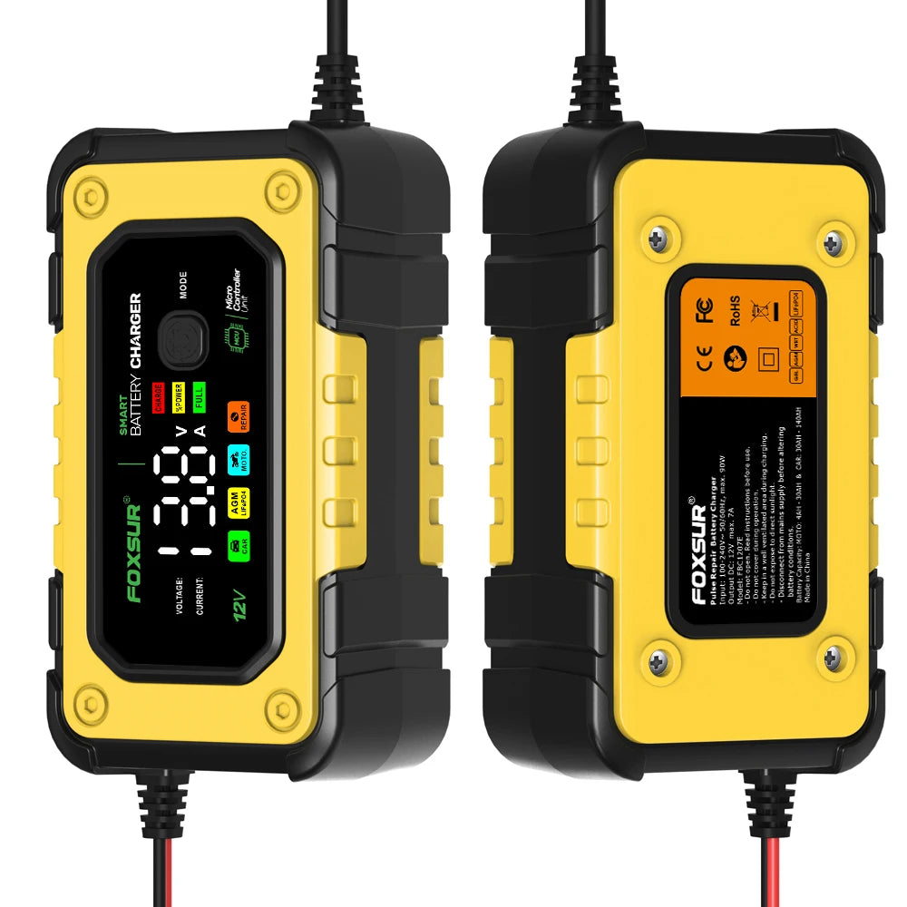 A yellow and black FoxSur smart 12V battery charger with a digital display and power cord.