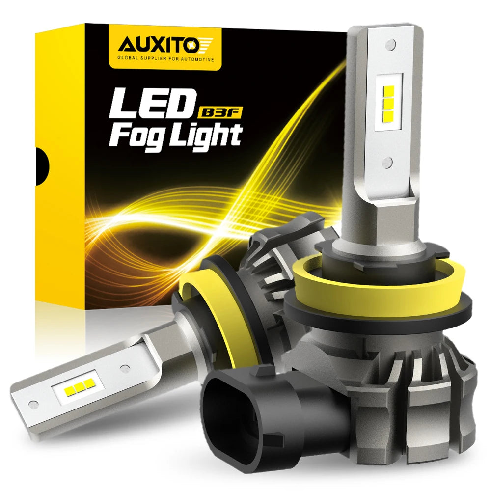 A box and a pair of LED fog lights are shown, featuring a silver housing and yellow accents.