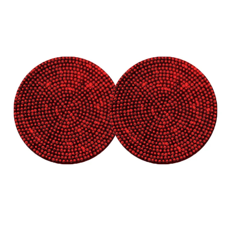 A set of two red non-slip diamond car cup holder coasters.