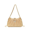 A gold-toned rhinestone evening clutch with a thin chain strap and a pleated, light beige fabric.