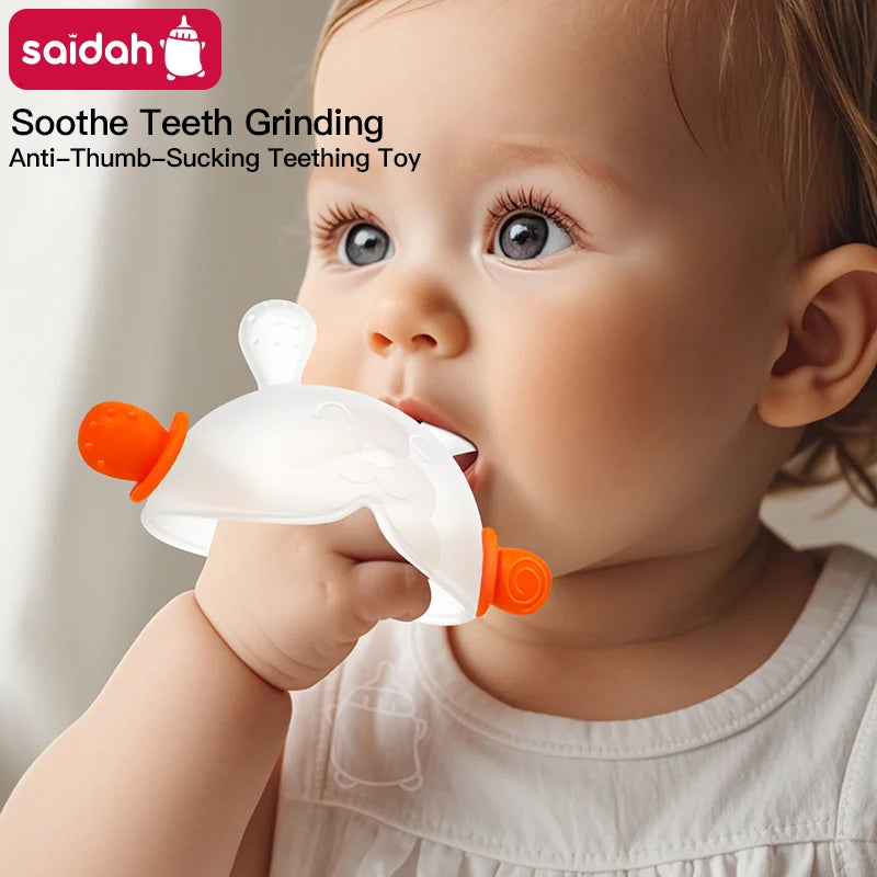 A baby is shown using a white bunny-shaped silicone teeth grinder teether with an orange handle.