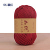 A ball of deep red crochet yarn labeled 06-Red, ready for crafting.