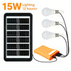 A black solar panel device is shown with three light bulbs and an orange power bank connected by wires.
