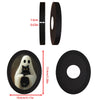 Black oval decorative ornament featuring a gothic ghost and black cat design