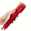 A hand is holding a red multifunctional faucet and sink wrench set.