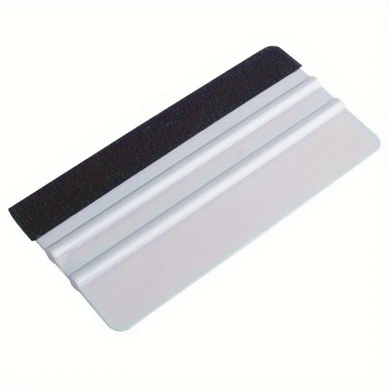A black and white scratch-free vinyl applicator tool with a flat, layered design.