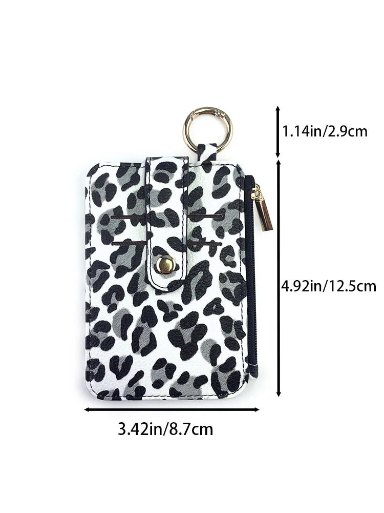 Leopard print PU leather card holder with a coin pocket and keychain, shown in a vertical orientation.