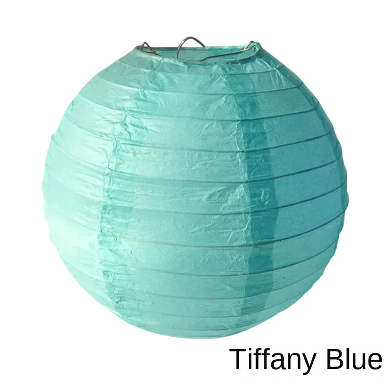 A light blue paper lantern with horizontal folds, suitable for weddings and parties.