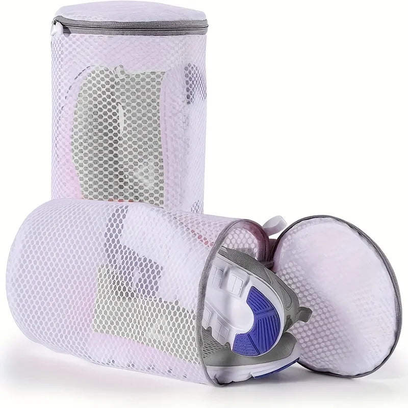 A pair of reusable mesh laundry bags for shoes and delicates in light purple and gray.