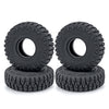 A pair of black rubber mud terrain tires for Axial SCX24 and TRX4M