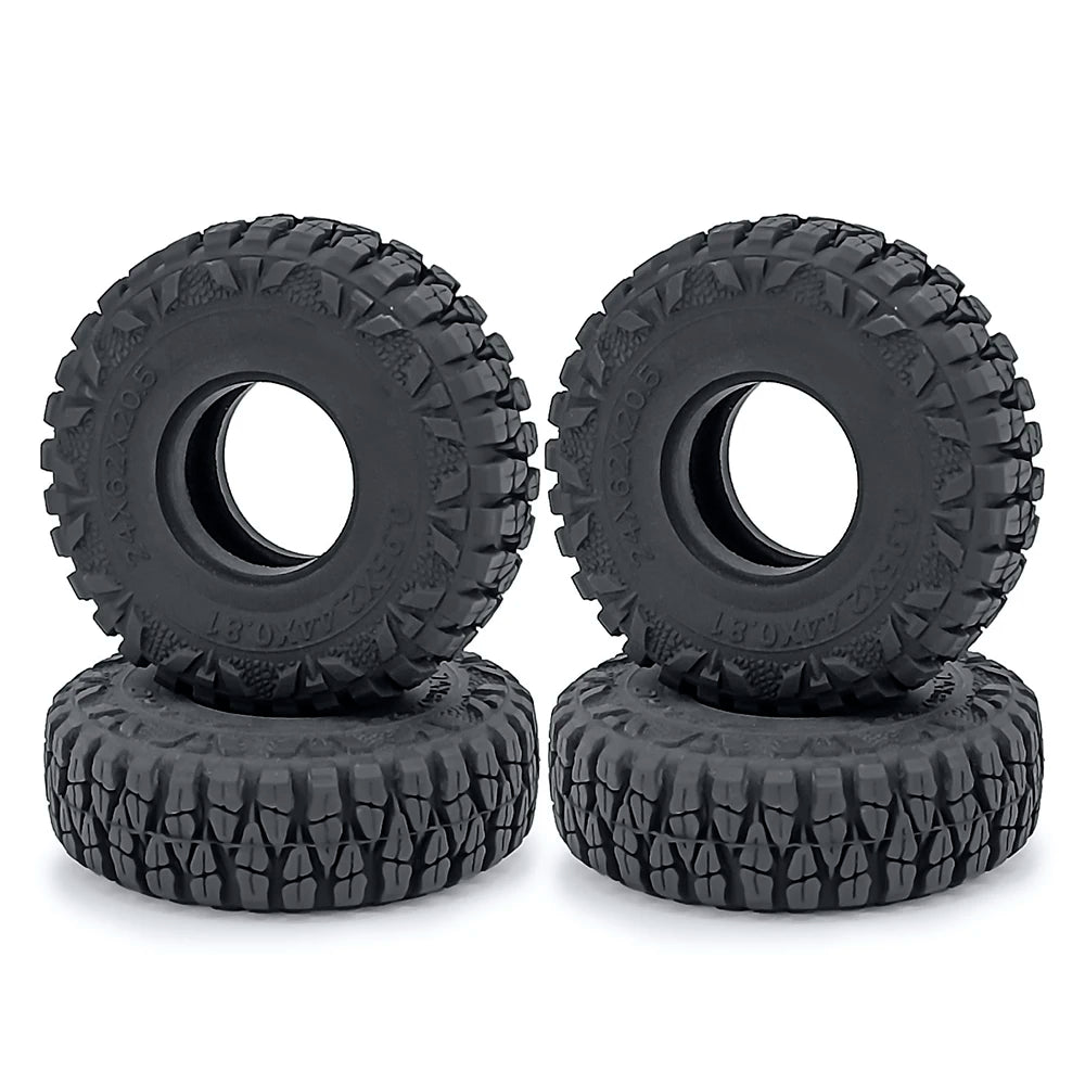 A pair of black rubber mud terrain tires for Axial SCX24 and TRX4M