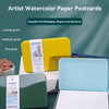 Artist watercolor paper postcards in tin packaging showing coarse, medium, and fine grain textures